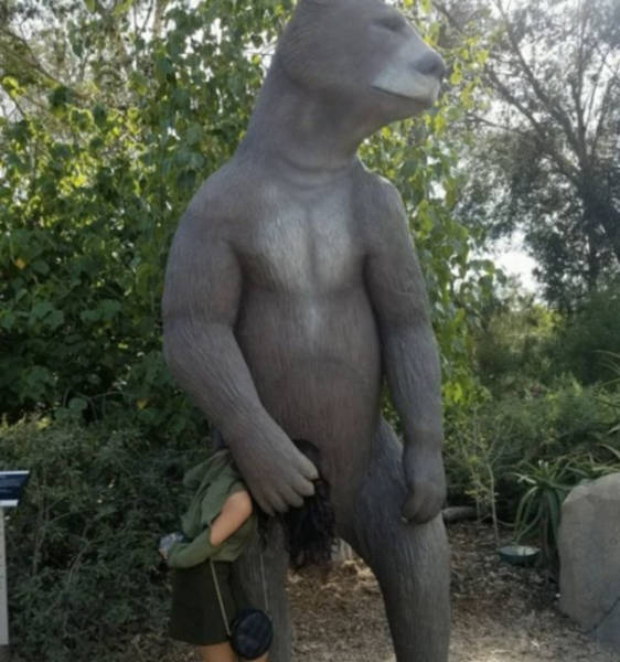 2-statue-woman-bear-perfect-timing