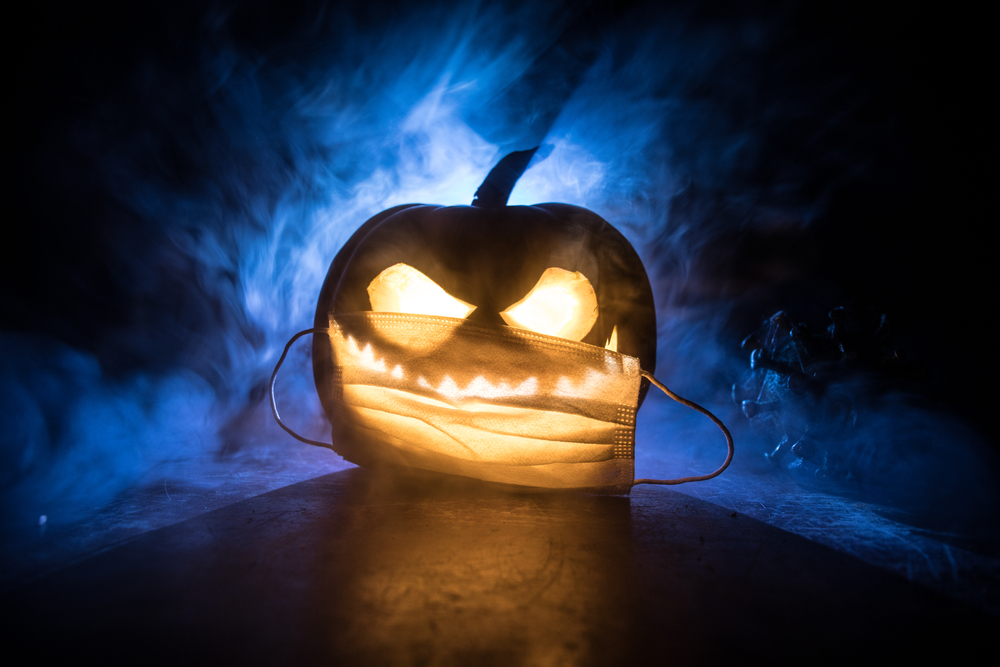 Halloween pumpkin with face mask.