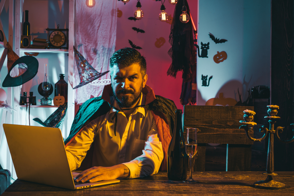 Man celebrating Halloween online.
